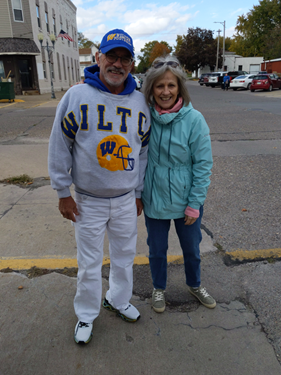 A person and person standing together
AI-generated content may be incorrect.